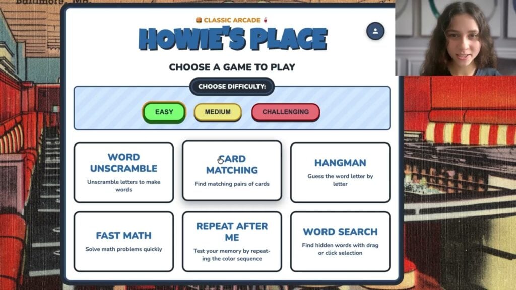Morgan Cole shows the Howie's Place game menu: word unscramble, card matching, hangman, fast math, repeat after me and word search